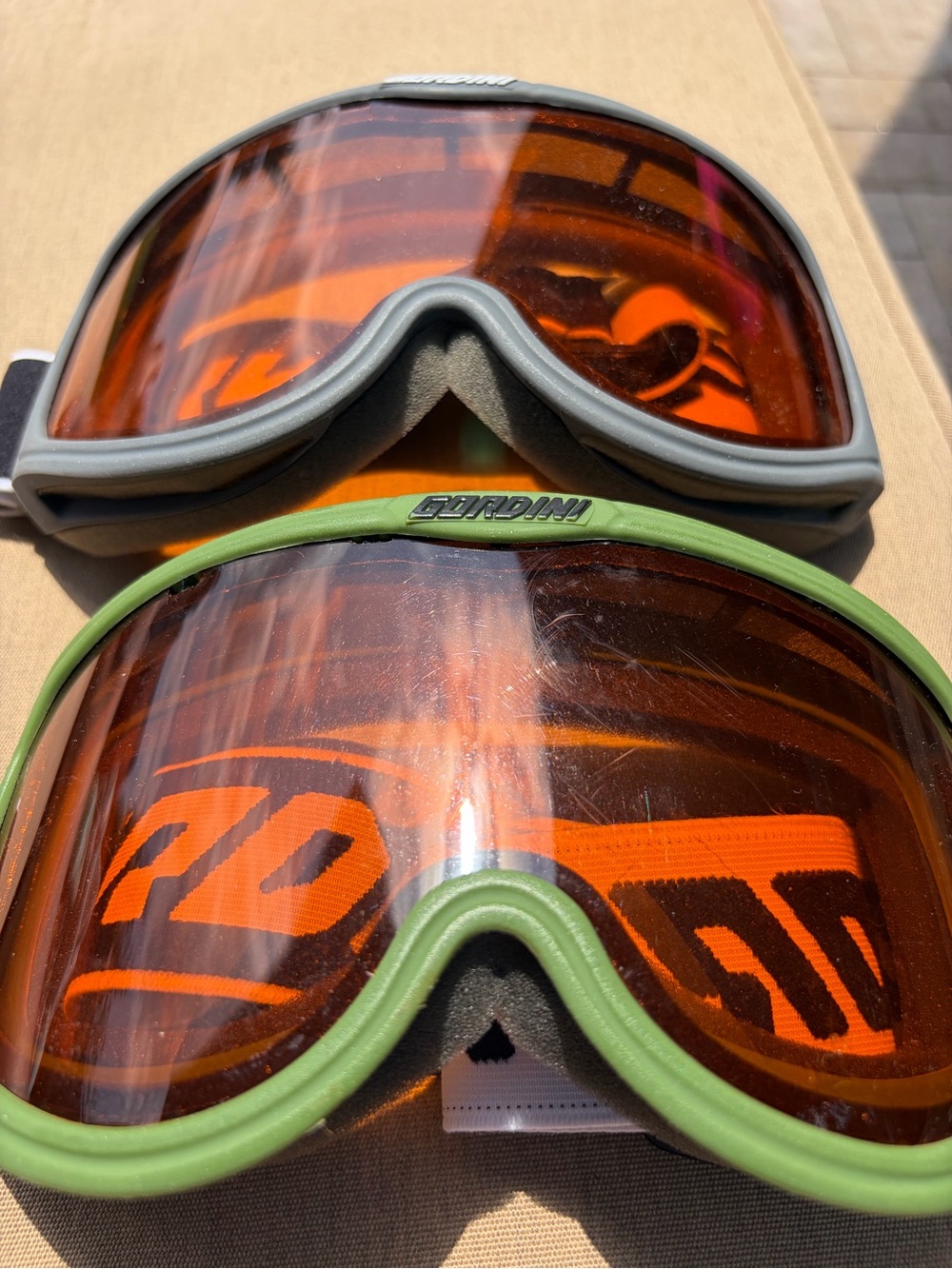 2 Gordini ski snowboard Goggles with Orange Mirrored Lenses and Green Trim